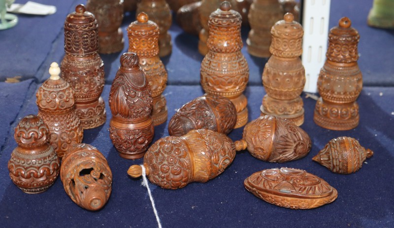 A group of 19th century carved coquilla nut containers, and pepper pots, tallest 12cm 5 - 11.5cm